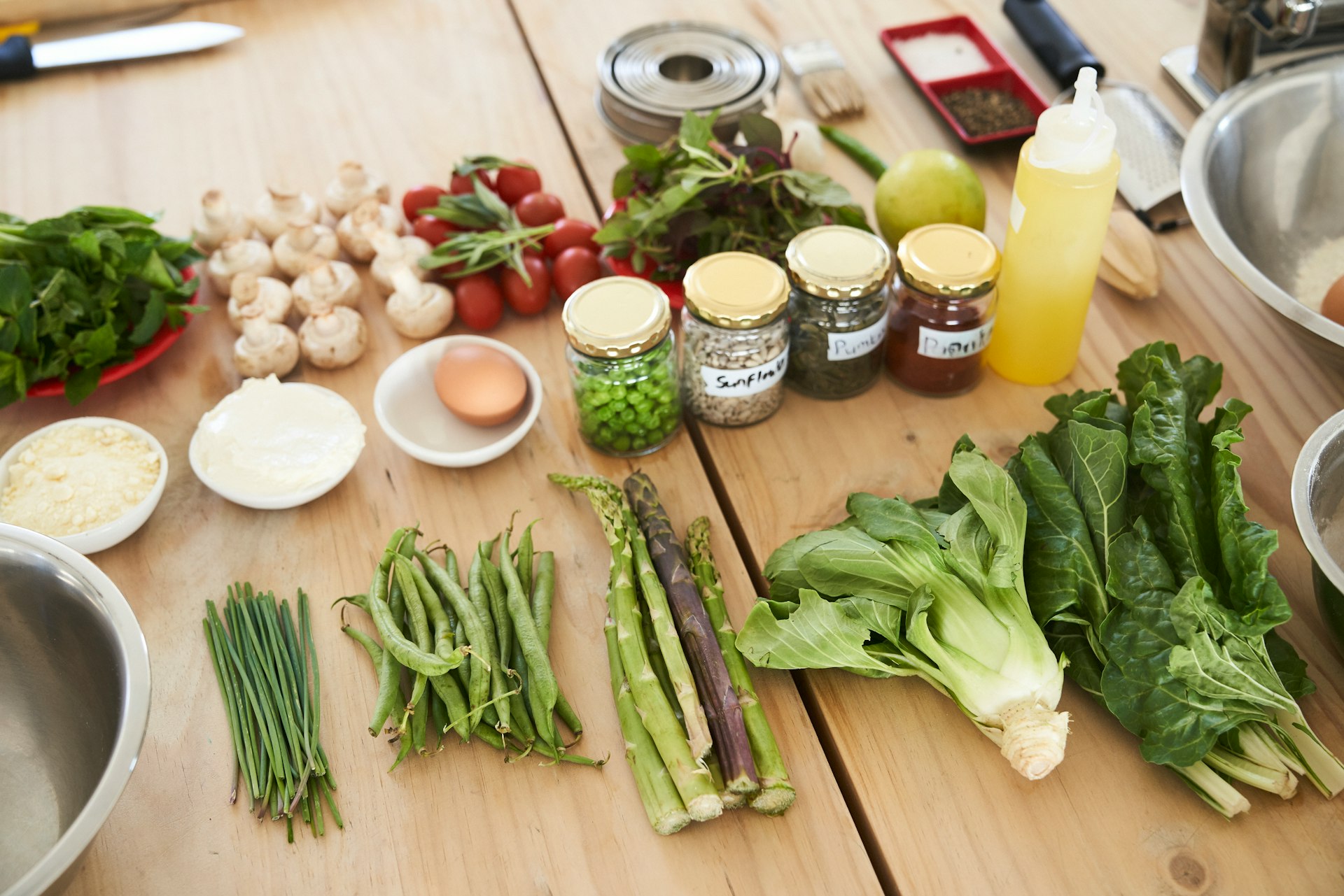 green vegetable on brown wooden table